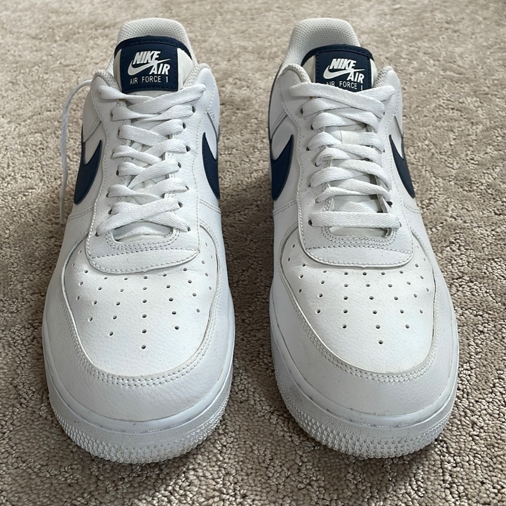 Used Men’s Nike Air Force 1 ‘07 White with Blue Swoosh. Good condition. Size 12